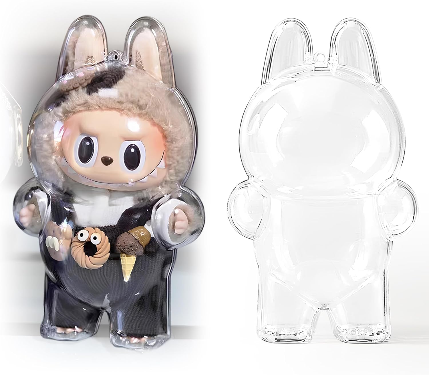 A heavy-duty clear acrylic protective capsule case designed for 17cm Labubu plush dolls, featuring a matching silicone carry strap