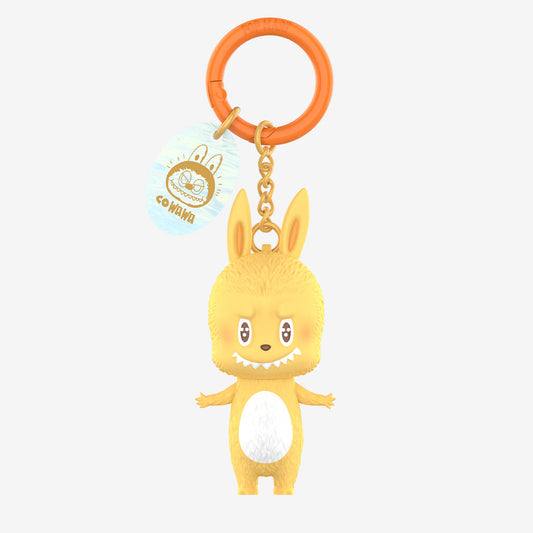 Yellow Labubu vinyl figure from The Monsters 10th Anniversary Series with an orange keyring