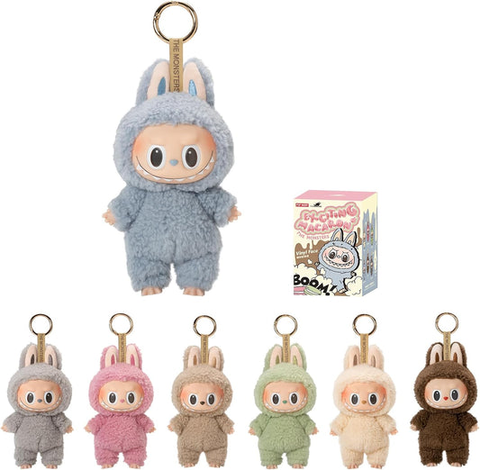 An official light blue Sea Salt Coconut POP MART Labubu Tasty Macarons vinyl face plush keychain doll showing its soft scruffy fur and signature toothy grin